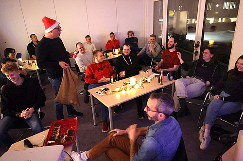 INCONY employees enjoy the sayings of Santa Claus